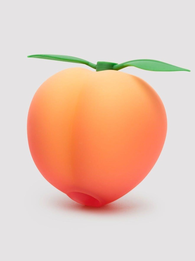 Womanizer Peach Toy stimulateur clitoridien
